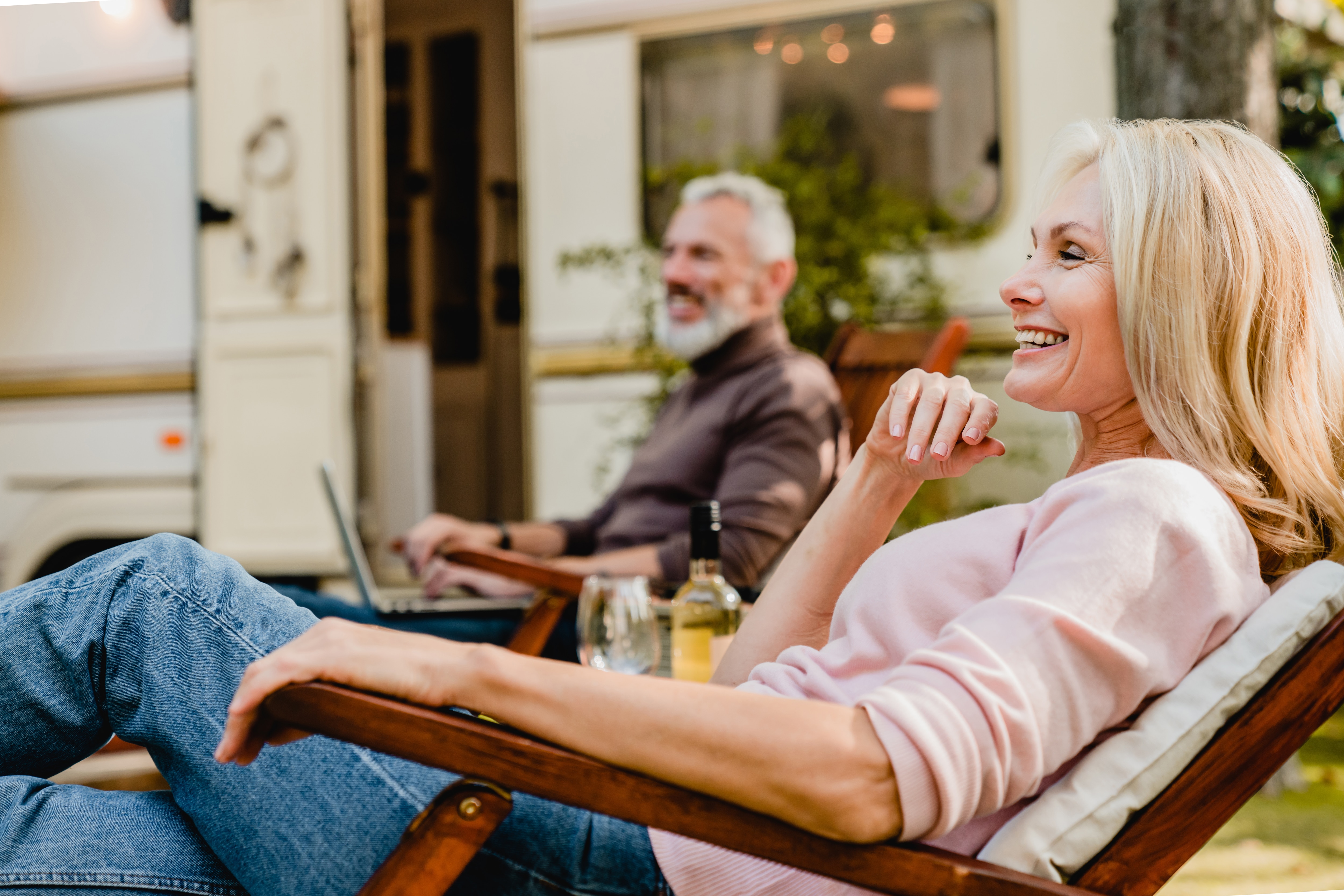 An older couple sitting back and relaxing